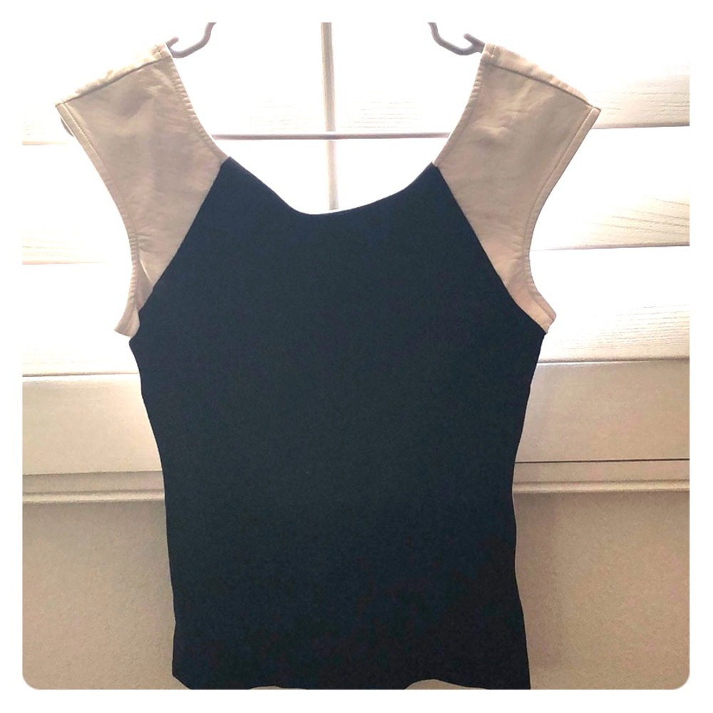 Black top with white leather